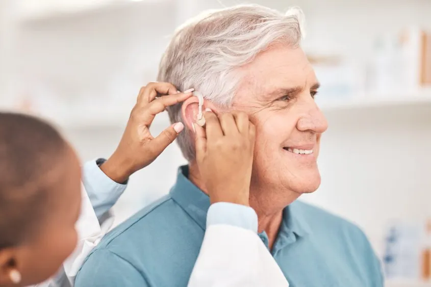 Audiologists put hearing AIDS on the elderly